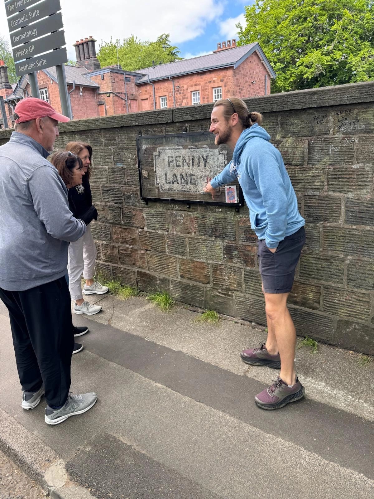 Guests photographing the Penny Lane sign